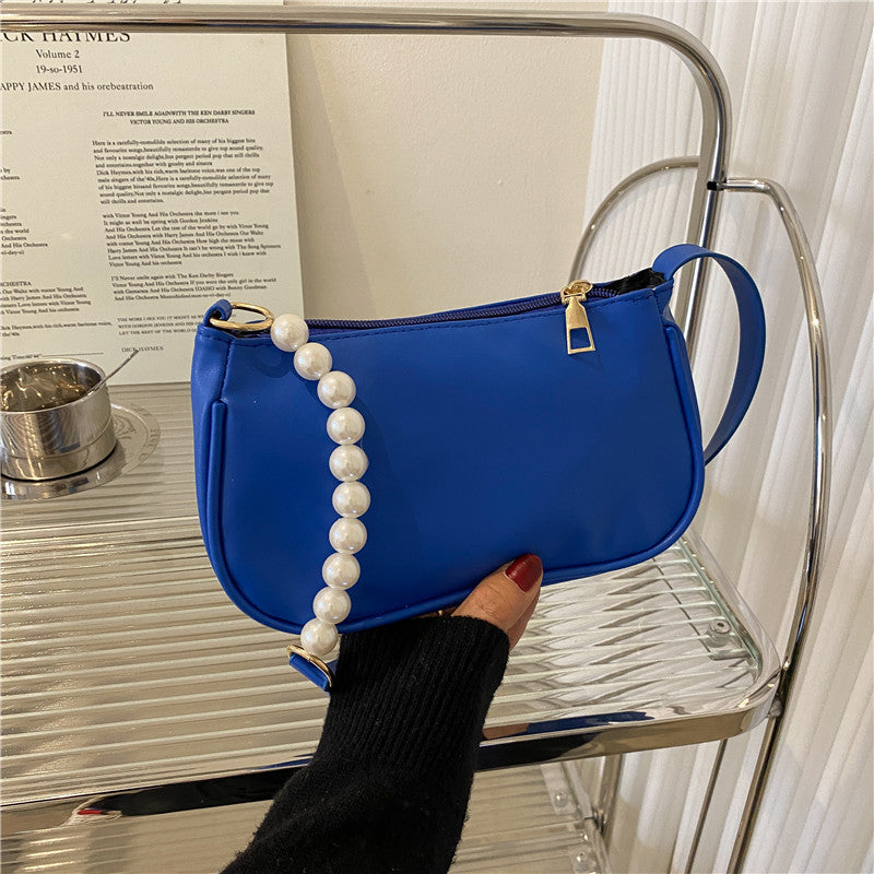 Spring And Summer New Trendy Ins Niche Design Pearl Chain Bag Women's Simple Armpit Bag Texture Shoulder Bag